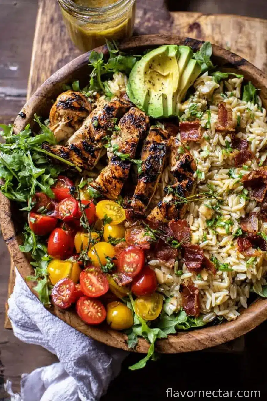 Grilled Lemon Herb Chicken Avocado Orzo Salad with Honey Mustard Bacon Dressing